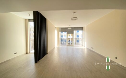SPACIOUS LIVING ROOM | POOL VIEW | VACANT