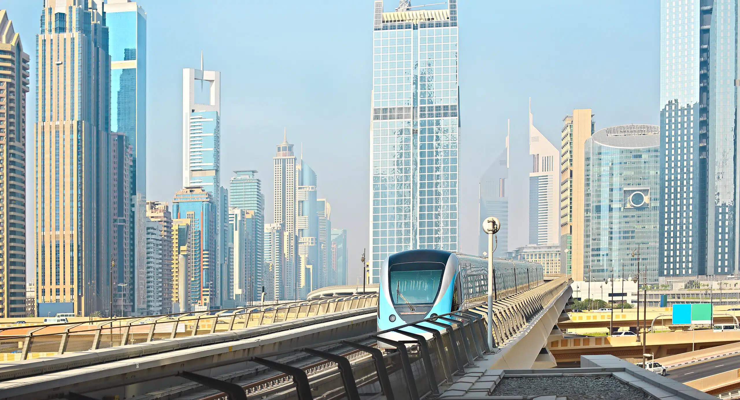 Dubai Metro station with surrounding residential towers illustrating how transport infrastructure drives property value appreciation in connected neighbourhoods
