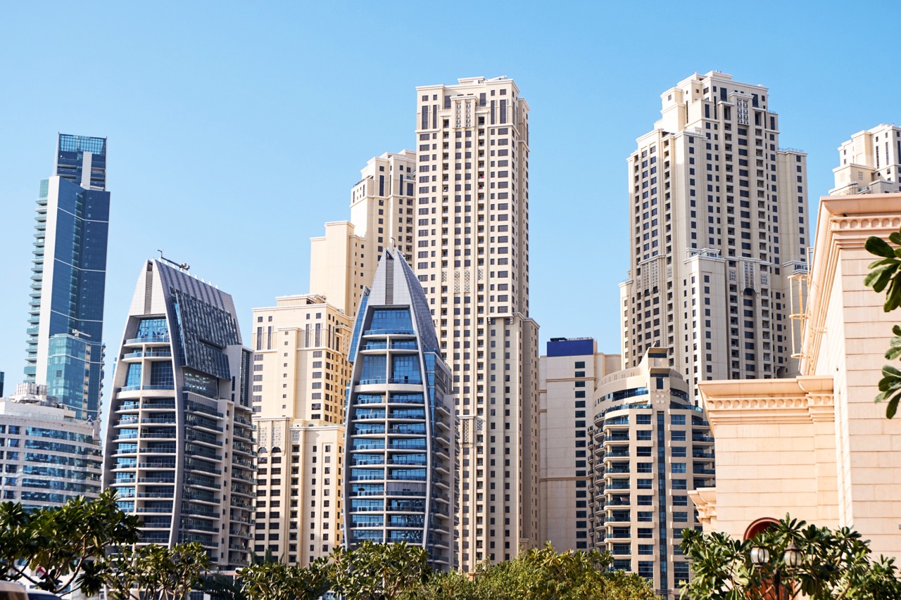 Dubai skyline with residential and commercial towers representing the city's dual appeal as both a tourism destination and long term residential market