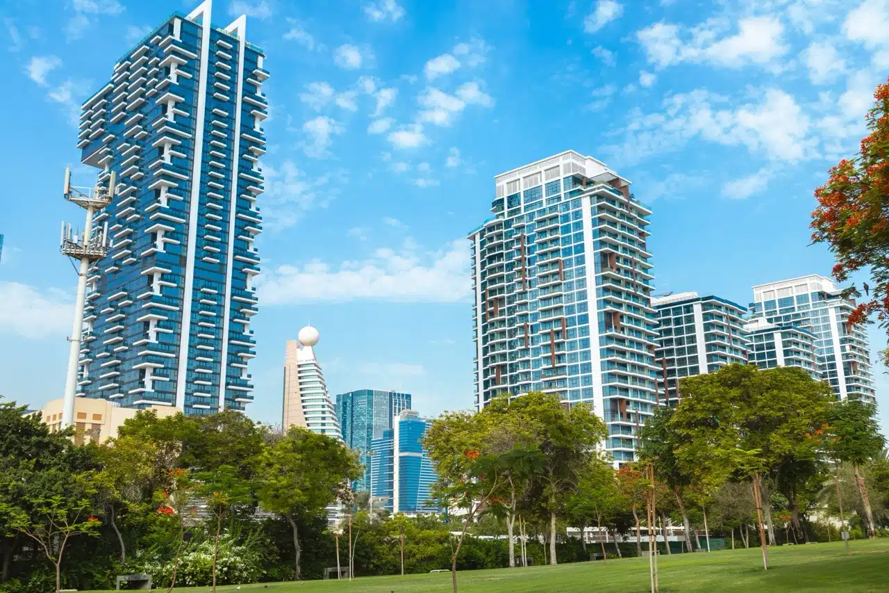 Affordable apartment community in Dubai such as JVC or International City showing accessible entry points for mid-market property investors